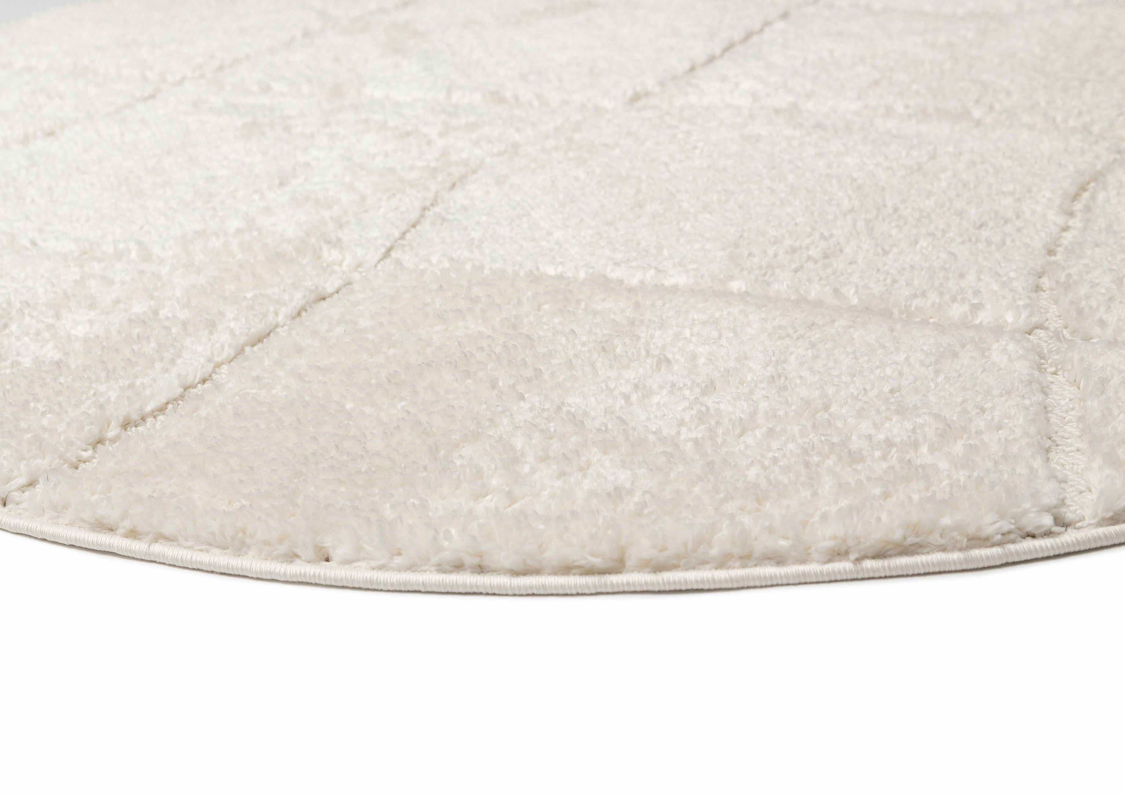 Calypso Ivory Cream Textured Tribal Round Rug