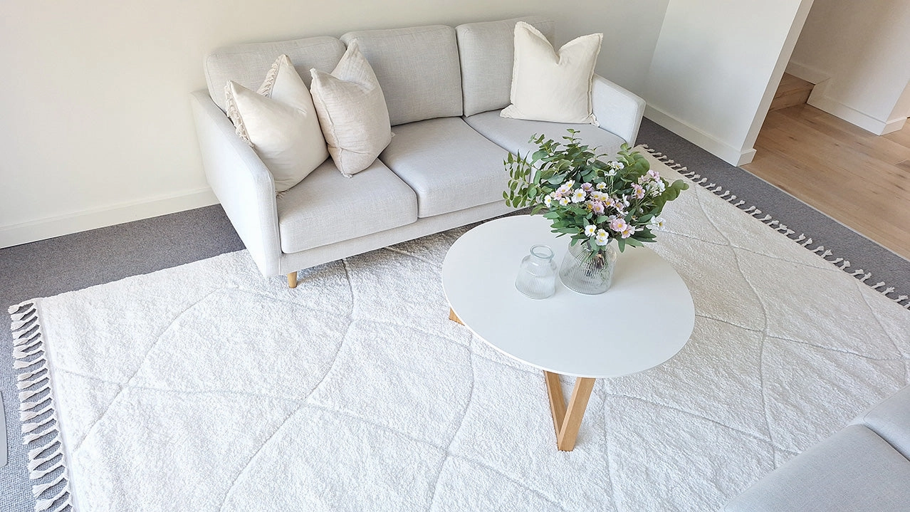 Calypso Ivory Cream Textured Tribal Tassel Rug