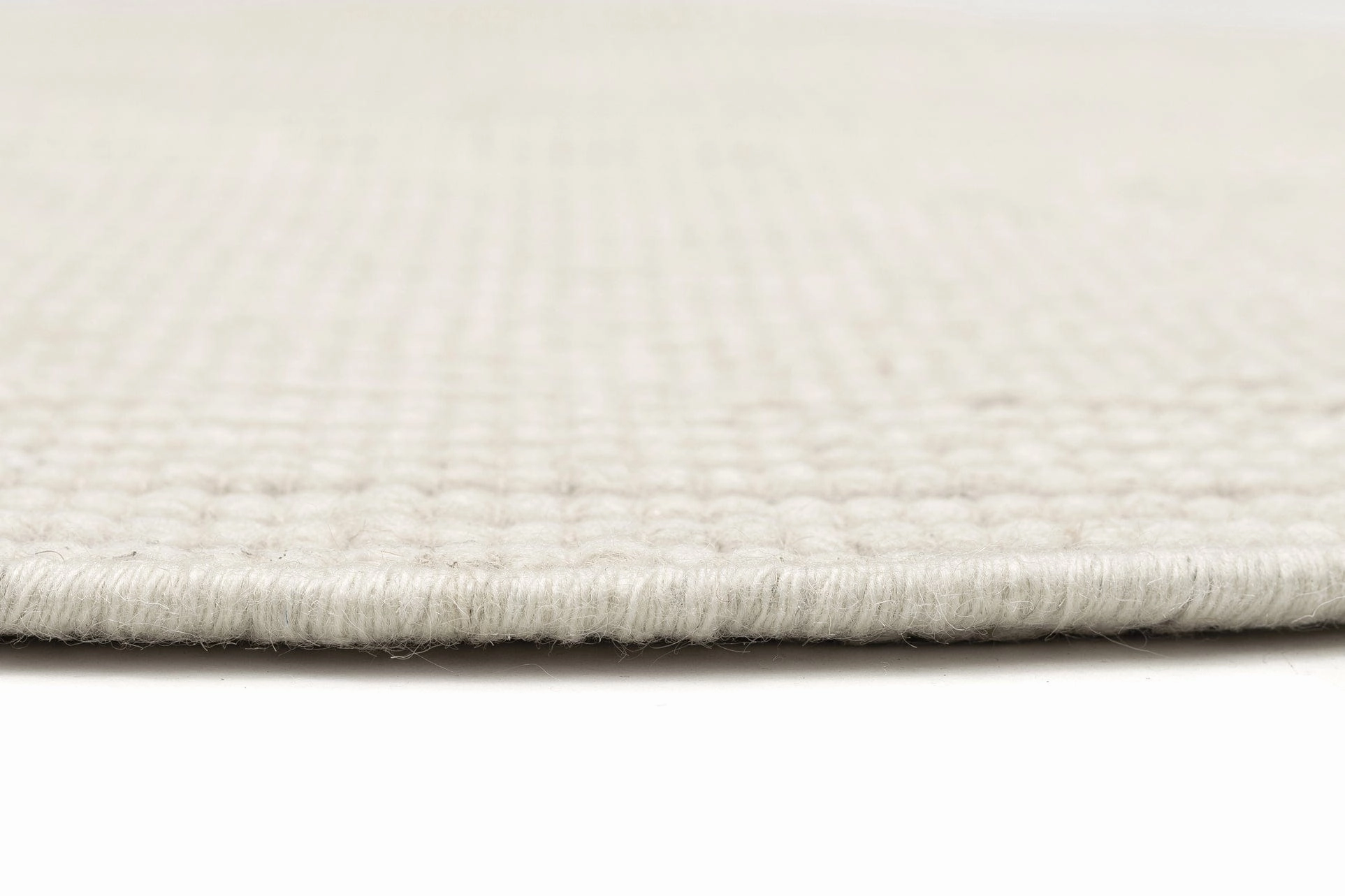 Larvic Ivory Chunky Wool Round Rug