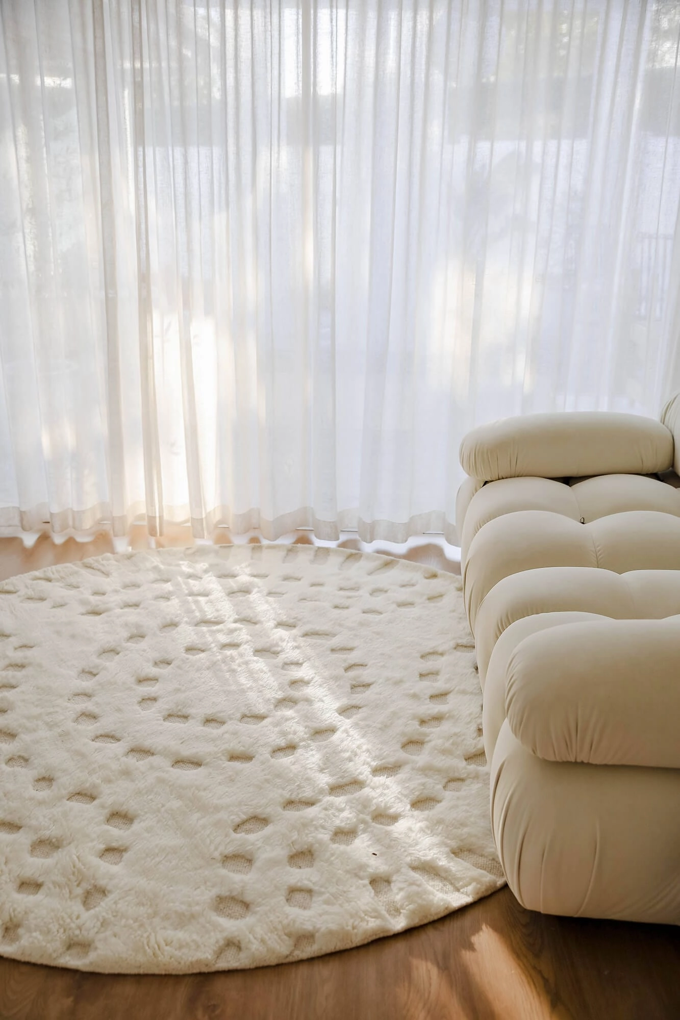 Omega Ivory Abstract Tribal Round Rug