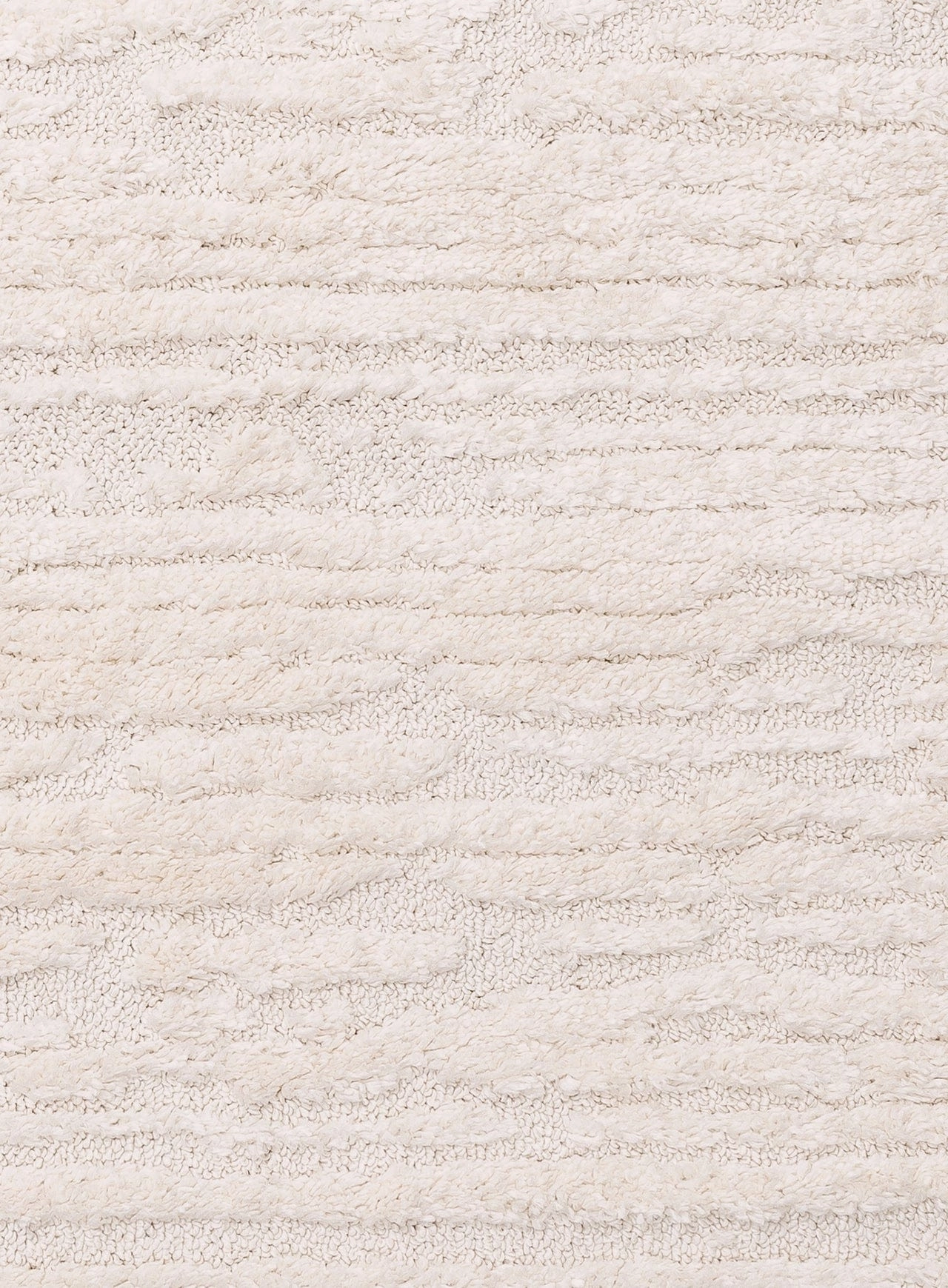 Serena Ivory Cream Textured Tassel Rug