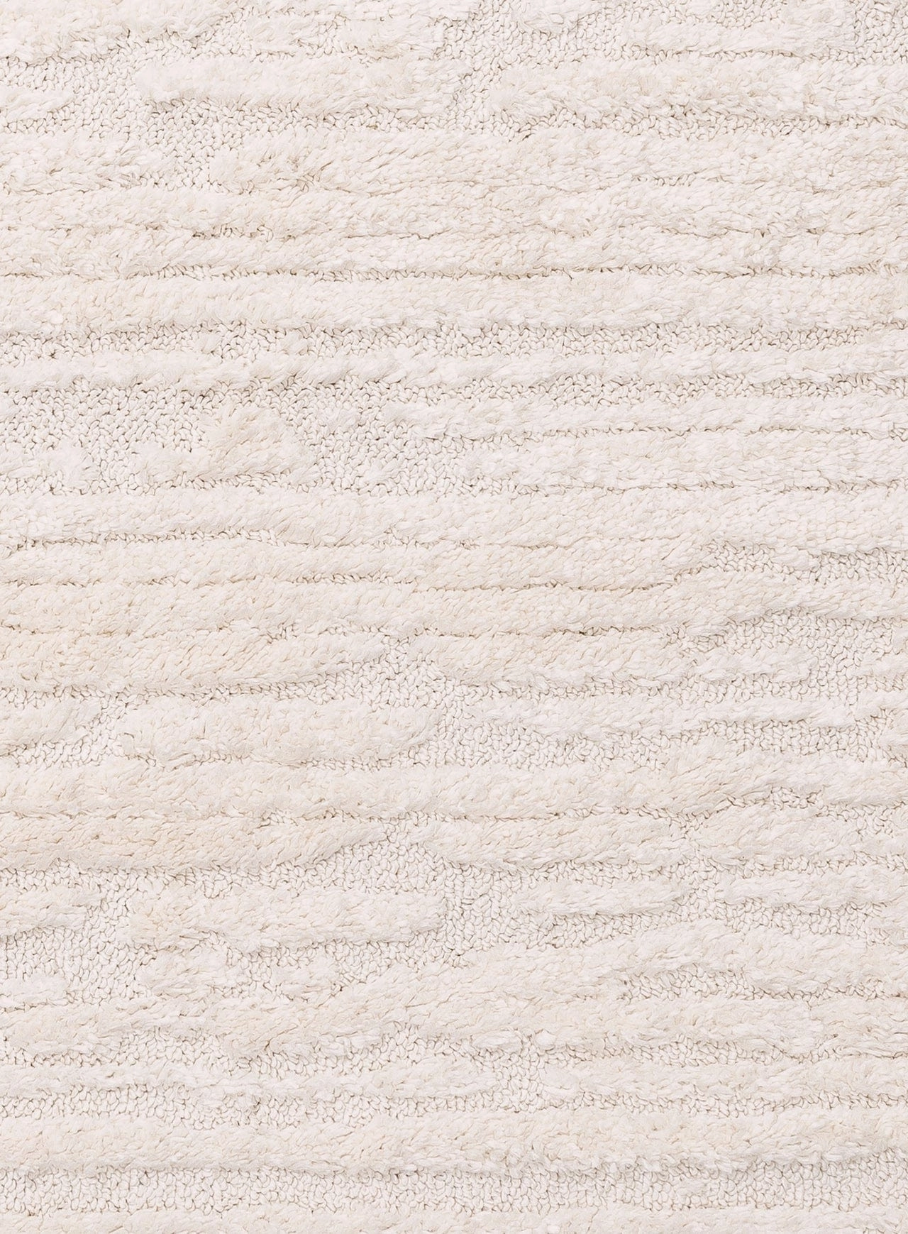 Serena Ivory Cream Textured Tassel Rug