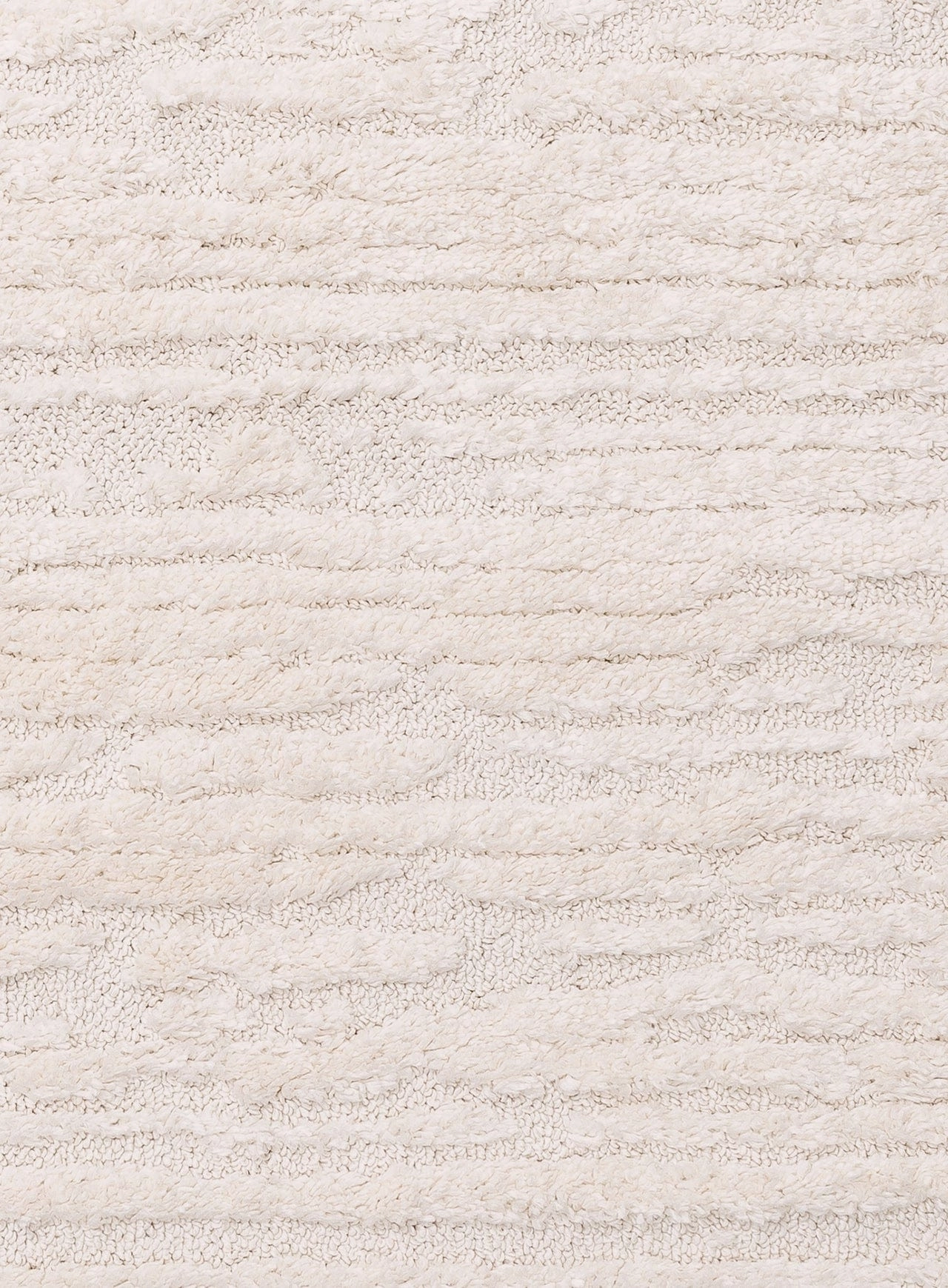 Serena Ivory Cream Textured Tassel Rug