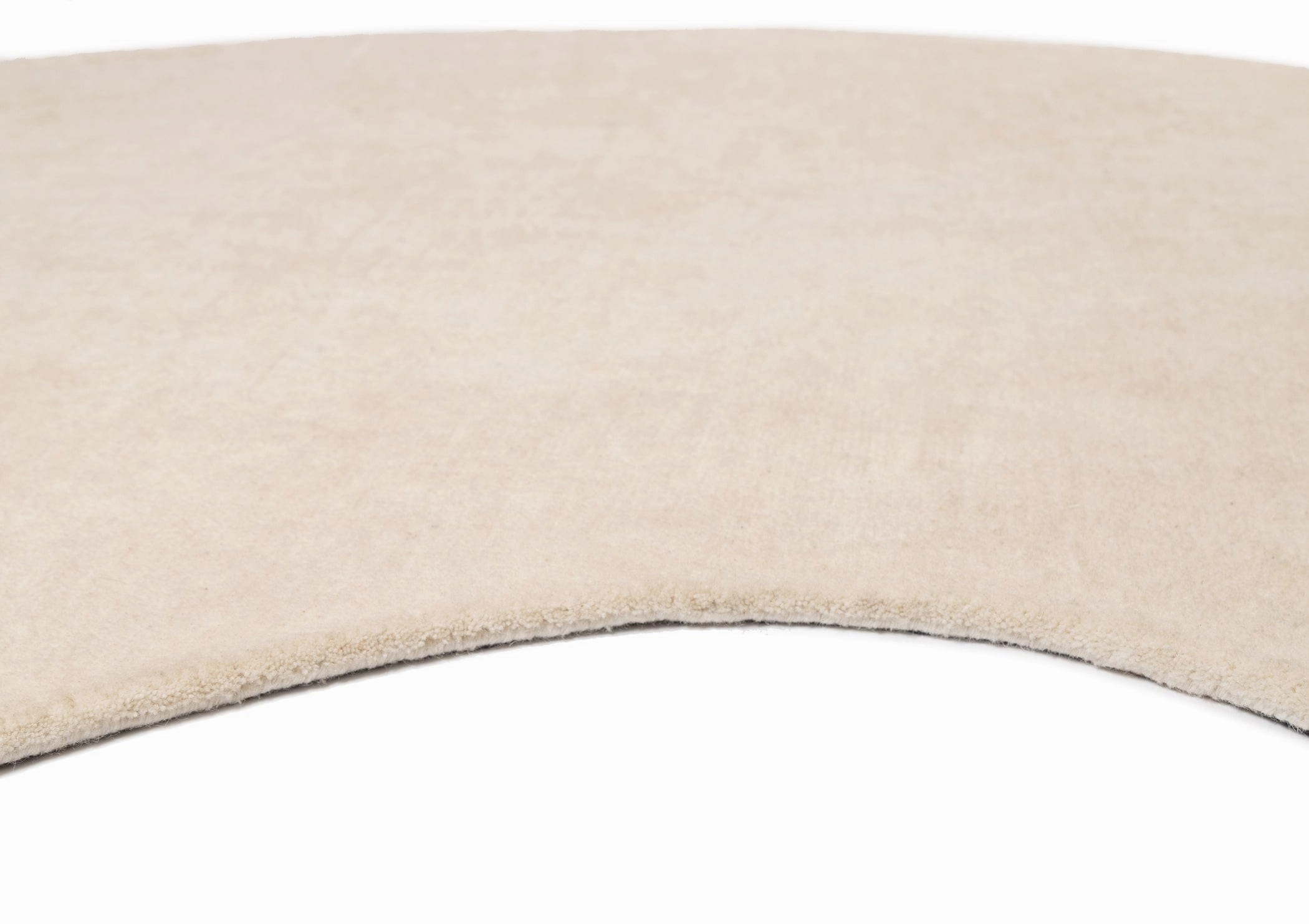 Vanni Solid Cream Curved Wool Rug
