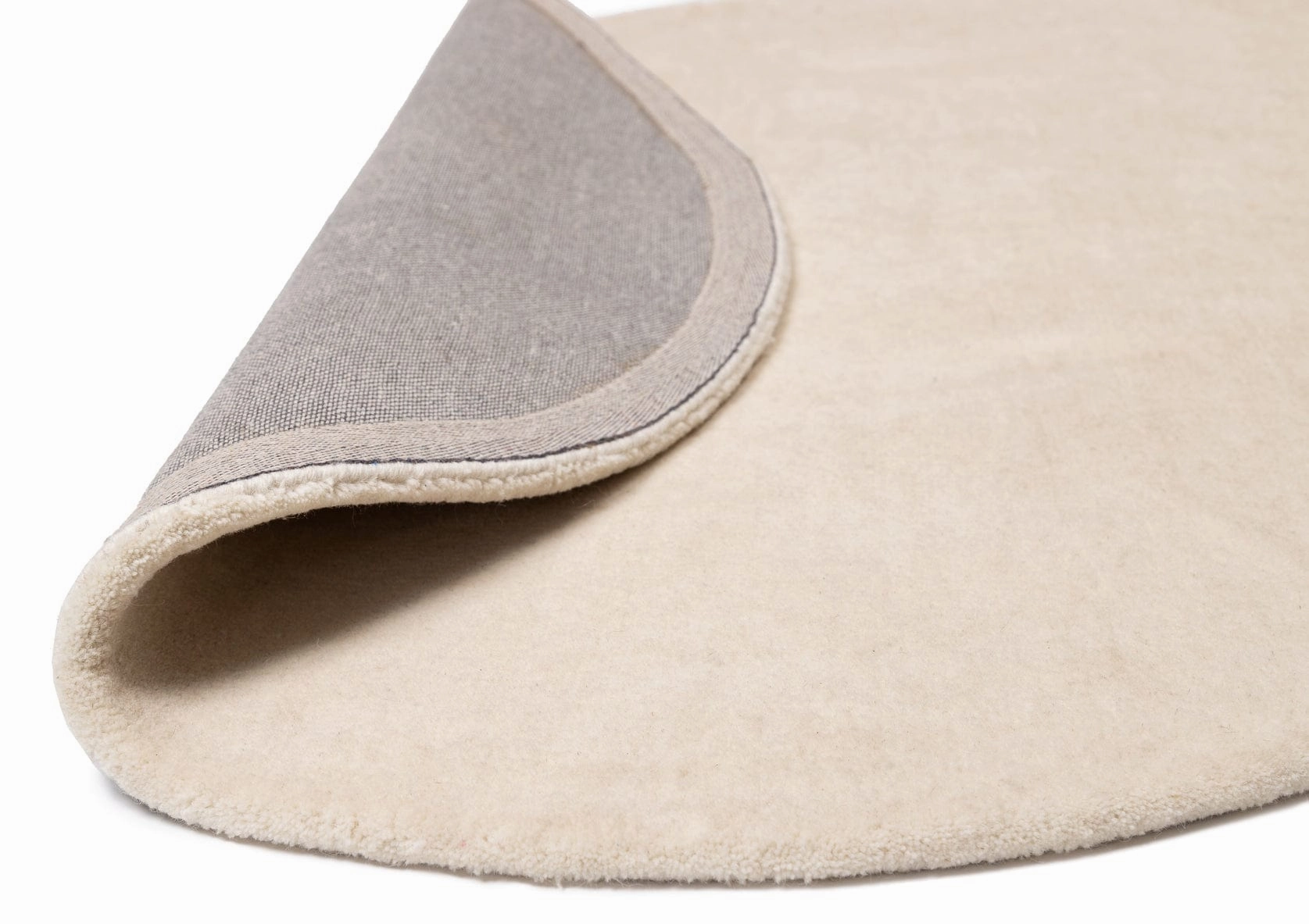 Vanni Solid Cream Curved Wool Rug